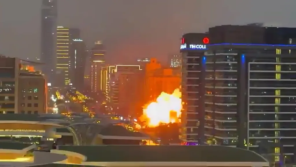 Dubai skyline under Iranian missile attack February 28 2026 — Fairmont Palm fire, DXB airport closed